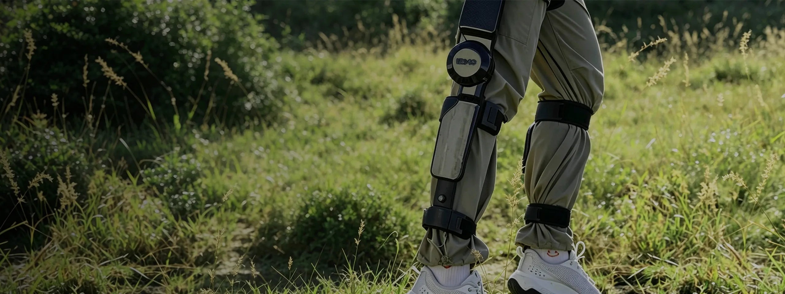IRMO M1 wearable exoskeleton outdoor scene showing app-controlled assistance modes and intelligent movement support